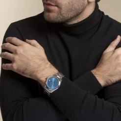 SEIKO Montre Classique Turquoise cadran argenté fond turquoise bracelet acier argenté